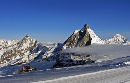 Piste basher on slopes in Cervinia, Italy - Weather to ski - Complete guide to summer skiing in the Alps, 2022