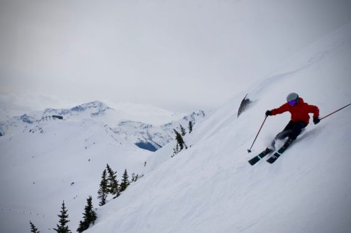 Skier on steep snowy slope in ski resort of Whistler, Canada – Weather to ski – Snow report, 17 February 2022