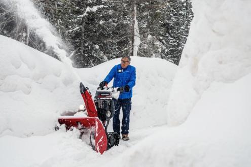 Person using machine to cut through deep snow in Snowbird, Utah, USA – Weather to ski – Snow report, 23 February 2024