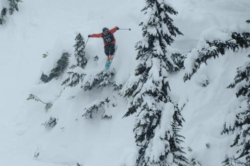 Skier leaping through powder on the slopes of Whistler, Canada – Weather to ski – Snow report, 15 March 2024