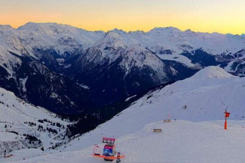 Sun setting over the snow-covered mountains in La Plagne, looking towards Courchevel – Weather to ski – Today in the Alps, 27 December 2023