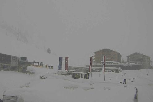 Snow-falling on the ski-slopes and buildings in Warth am Arlberg, Austria – Weather to ski – Today in the Alps, 23 January 2024