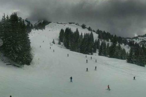 Cloudy skies over the ski-slopes of Les Gets, France, which have modest snow cover – Weather to ski – Today in the Alps, 12 February 2024