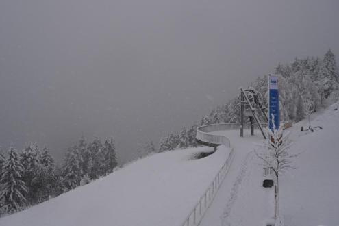Snow falling on the snow-covered mountainside of Seefeld, Austria – Weather to ski – Today in the Alps, 23 February 2024