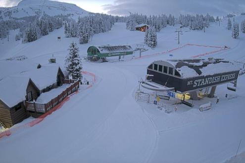 View of the base of ski lifts in the Banff-Lake Louise ski area in the morning, with plenty of fresh snow having fallen overnight – Weather to ski – Snow report, 29 March 2024