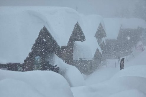 Serious accumulations of snow on the ground and chalet-style buildings in La Rosière ski resort in France – Link to Weather to ski's full "Today in the Alps" report on weather and snow in the Alps on 20 February 2026