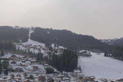 Hazy skies over Les Gets ski resort, France, due to Saharan dust – Link to Weather to ski's full "Today in the Alps" report on weather and snow in the Alps on 5 March 2026