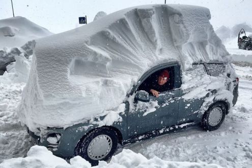 Car almost buried by deep snow in Artesina near Prato Nevoso in the Italian Alps on 1 March 2016