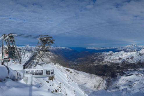 Snow covered mountainside and ski lift viewed from the Cime de Caron webcam at 3200m in Val Thorens, France, on 26 October 2026 - Link to Weather to ski's report on Today in the Alps, 26 October 2026