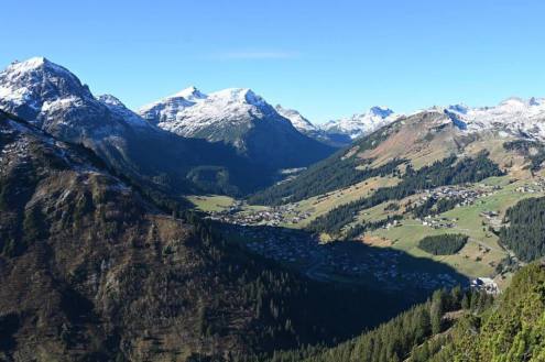 Panoramic view of the valley and mountainside in Lech, Austria, on 27 October 2026, where the snowline has visibly moved further up the mountain since the weekend’s snow - Link to Weather to ski's report on Today in the Alps, 27 October 2026